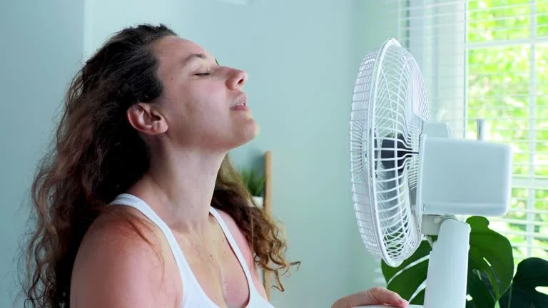 How to Use a Window Fan to Cool a Room Like a Pro