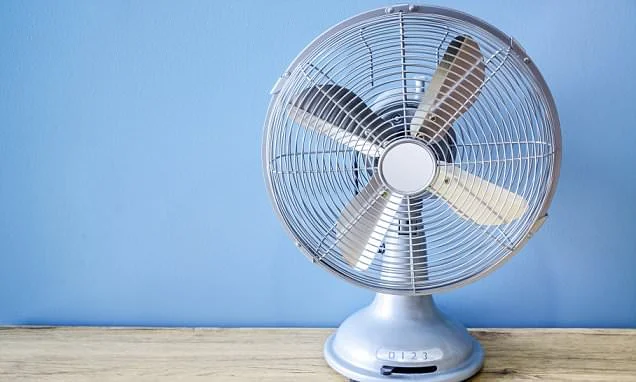 Sleek tower fan operating in a modern living room